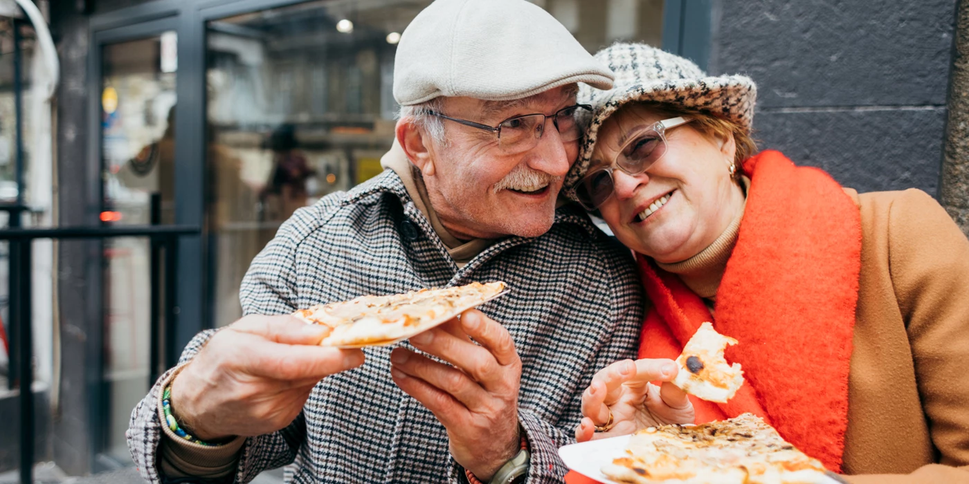 Smiling senior couple enjoying a moment together outdoors